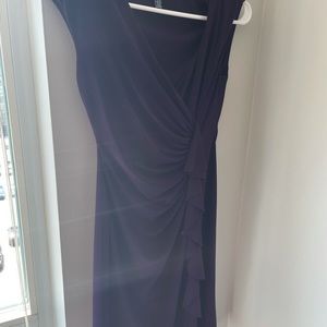 Wine deep purple gorgeous dress in size small. Great dress and very classy.
